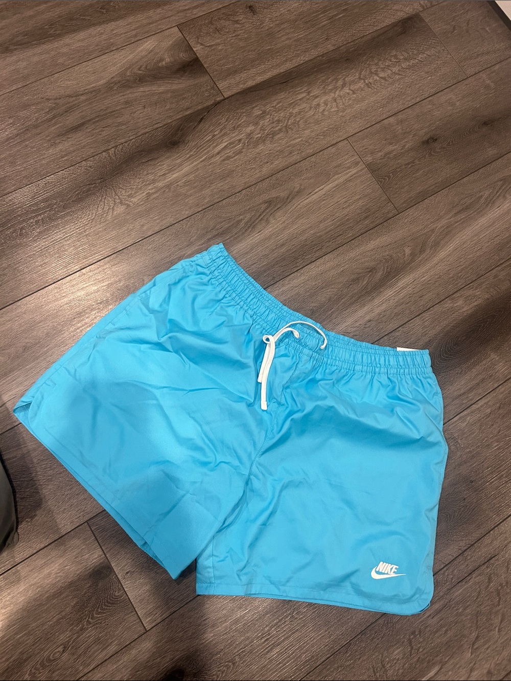 Nike Men’s Bright Turquoise Swim Trunks